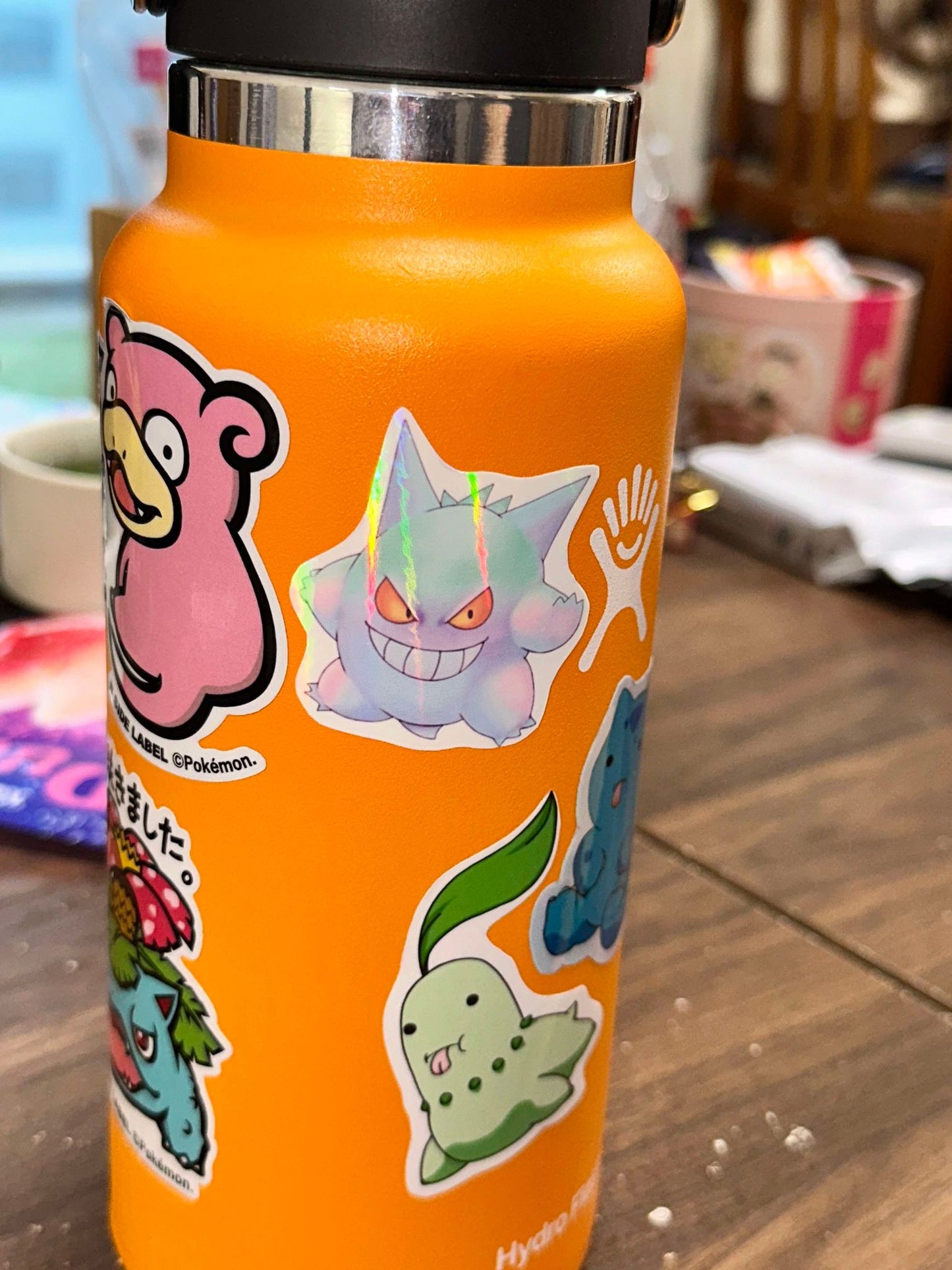 showing the stickers on my water bottle for the pastel pokemon gengar, haunter and gastly stickers