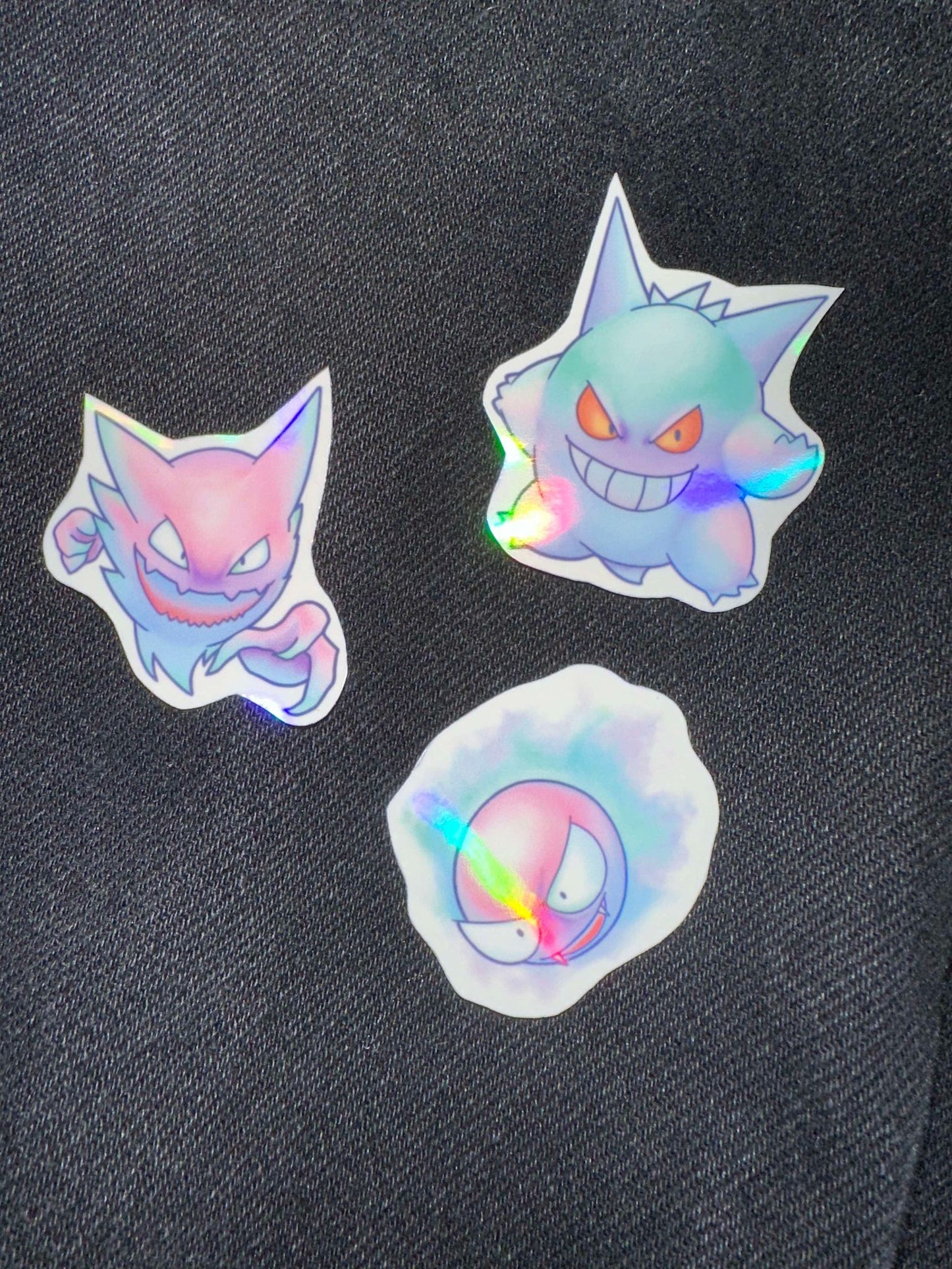 showing the set with a different background for the pastel pokemon gengar, haunter and gastly stickers