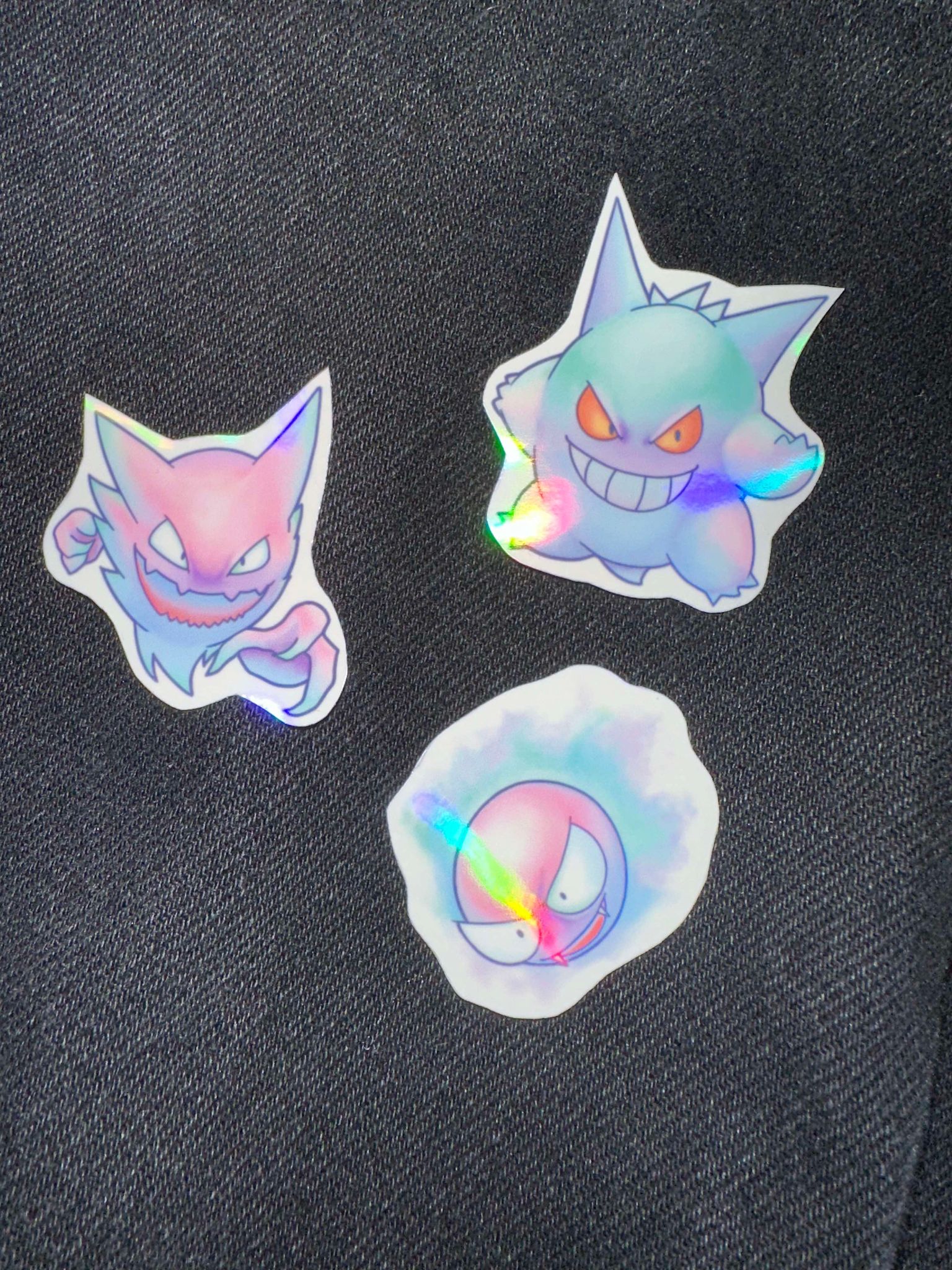 showing the set with a different background for the pastel pokemon gengar, haunter and gastly stickers