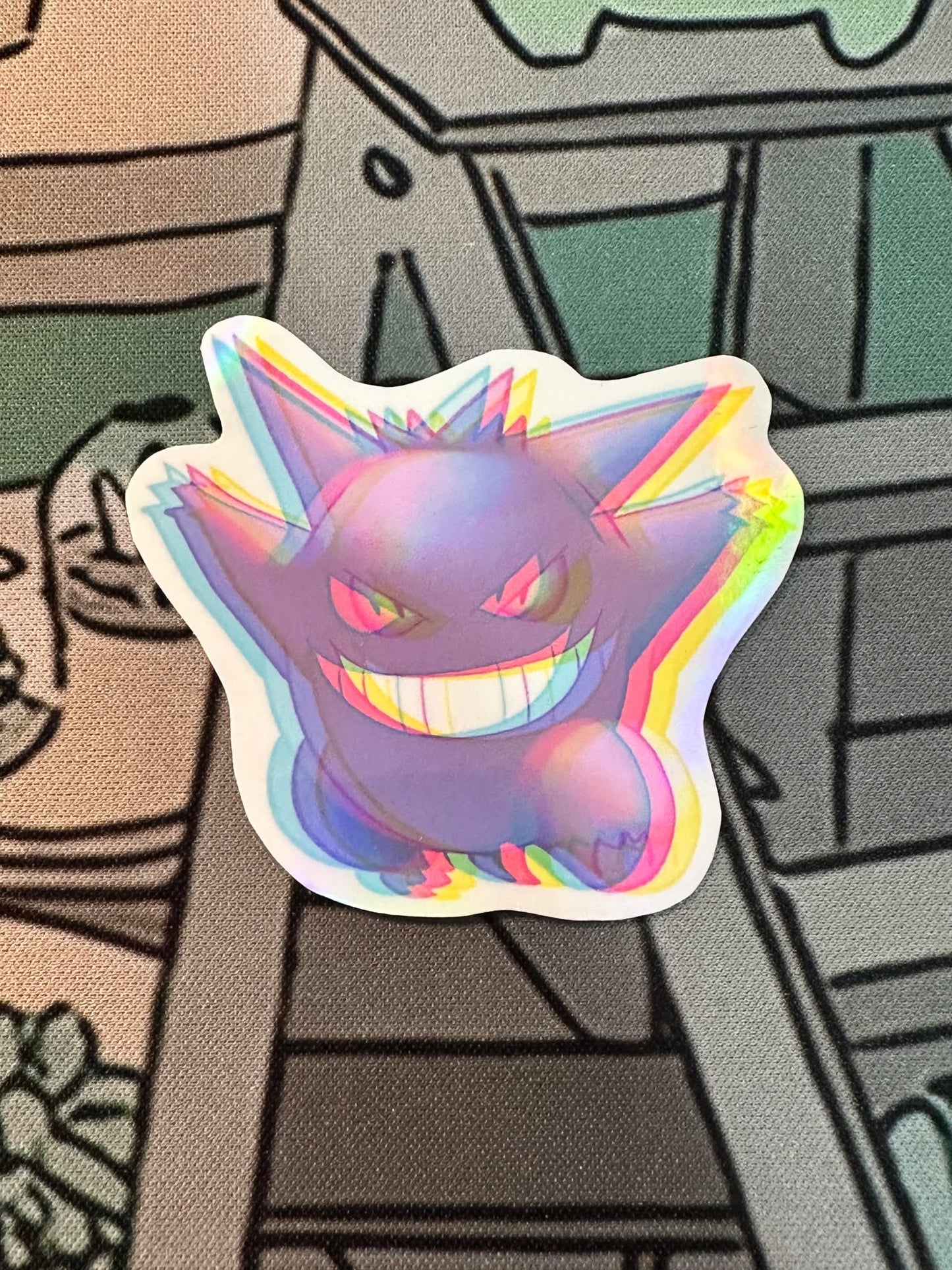 showing the variants with different backgrounds for the color shift pokemon gengar sticker