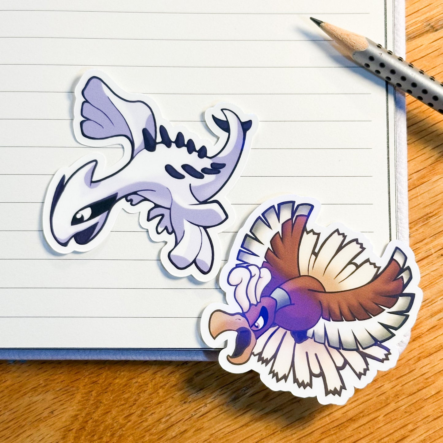 showing both variants together for the pokemon lugia and Ho-oh (Ho oh) stickers
