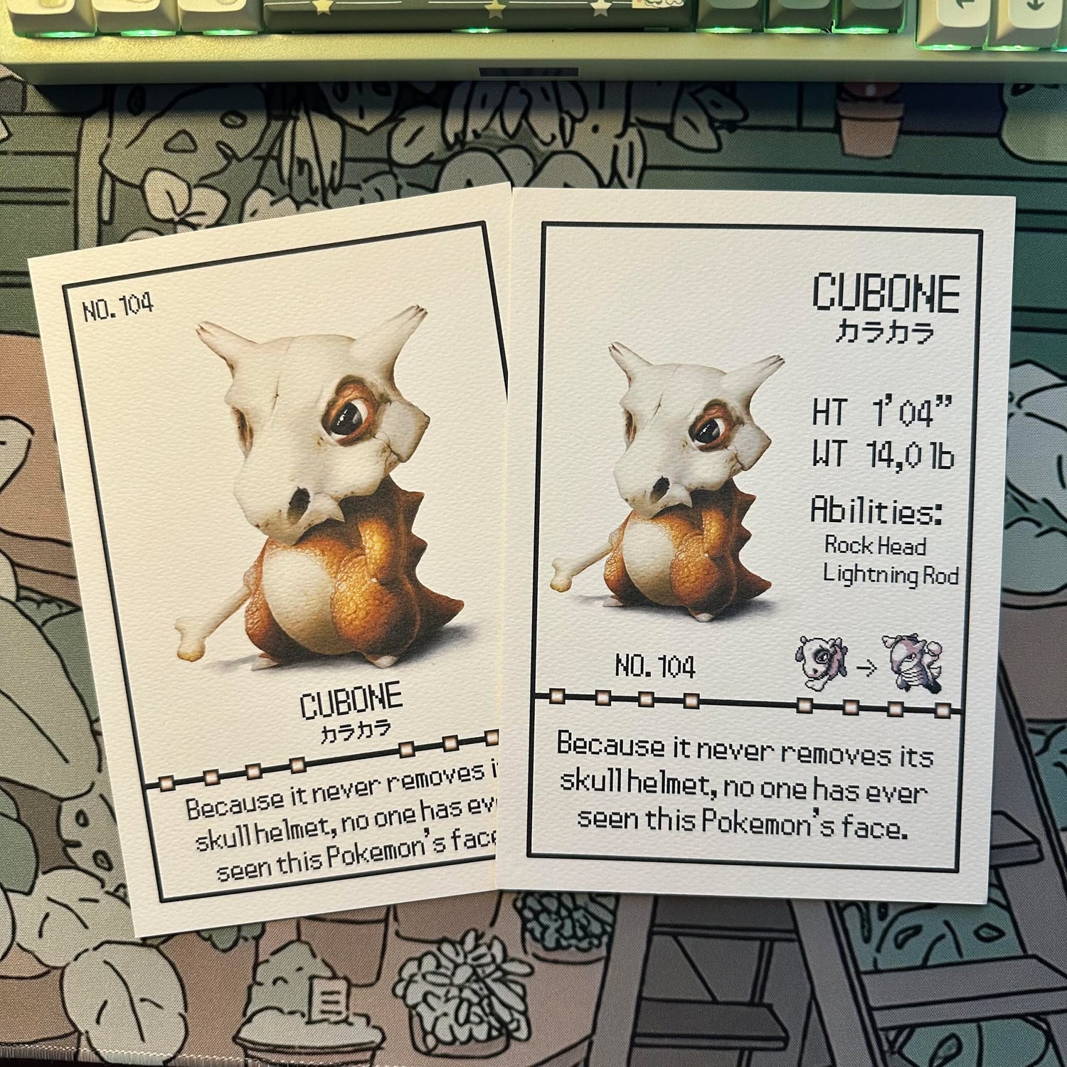 Showing both variants of the pokemon cubone pokedex print in 1 photo