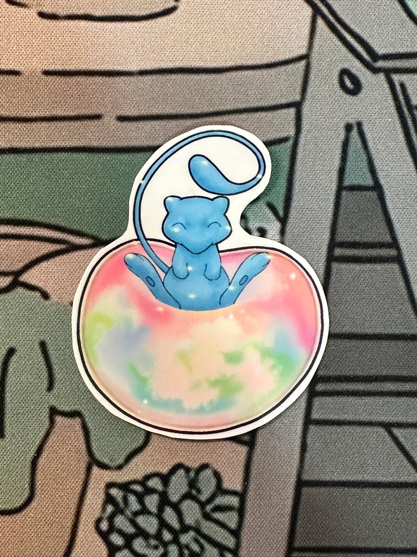 showing the shiny variant on a different background for the pokemon mew sticker