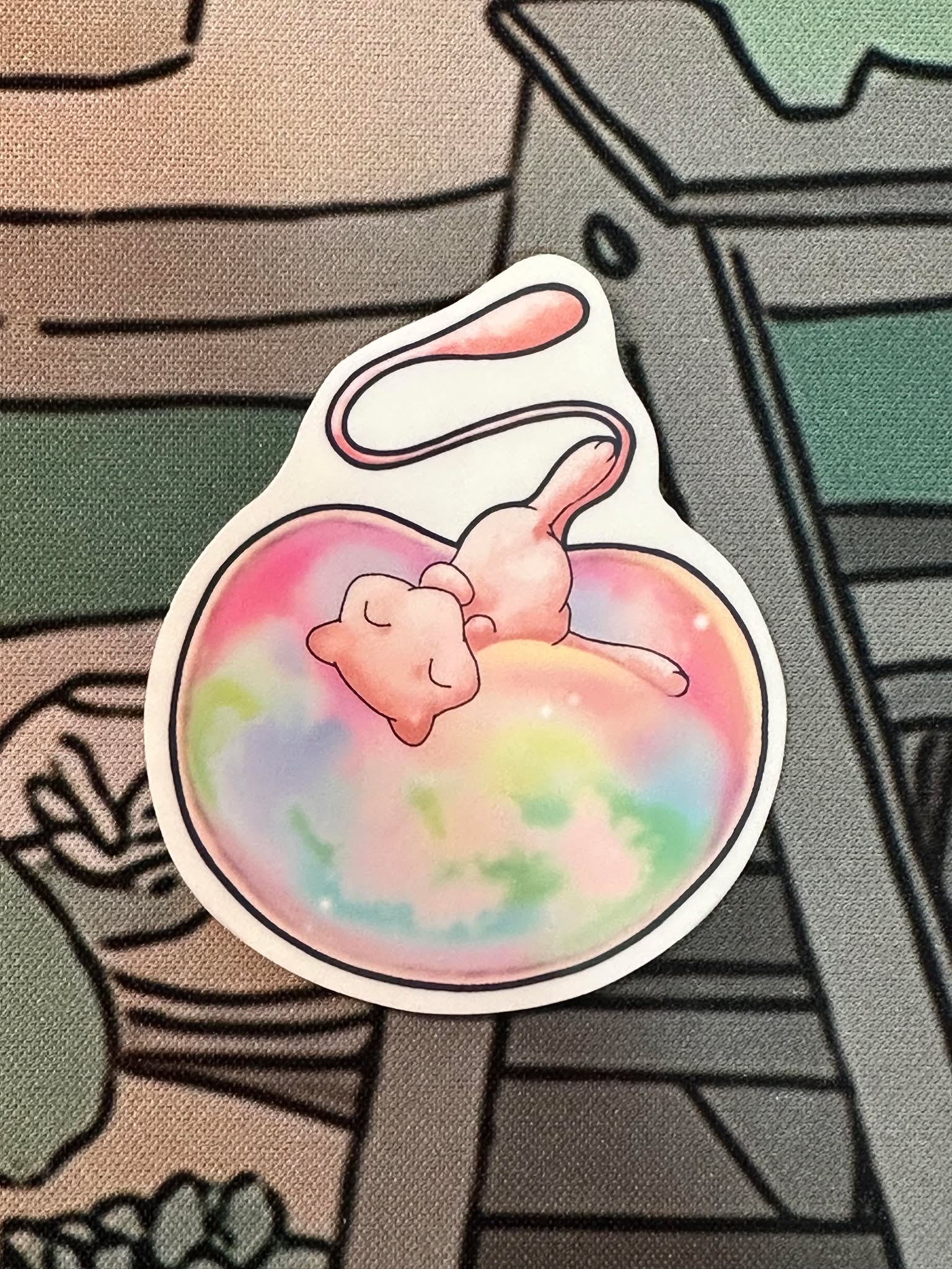 showing the basic type by itself on a different background for the pokemon mew sticker